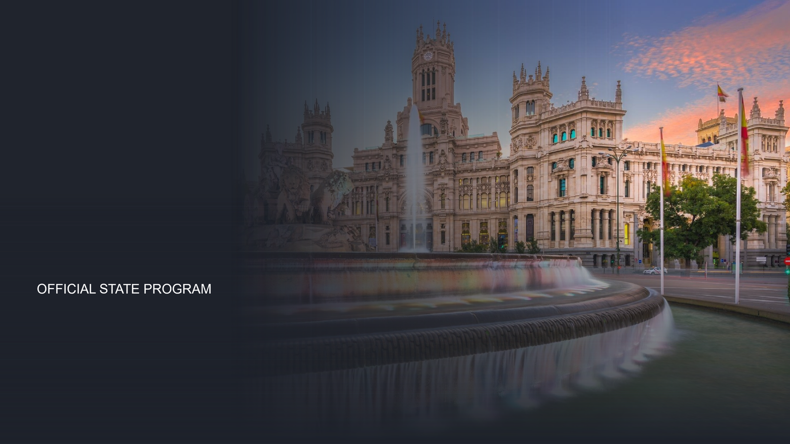 Cibeles Fountain and Palacio de Cibeles in Madrid at sunset with Spanish flags